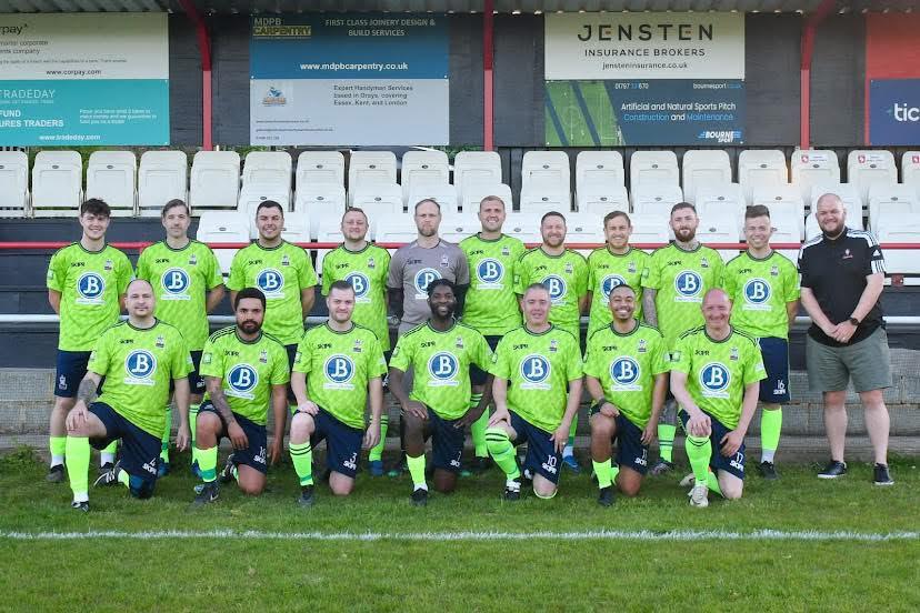 Local football team supported by JB Exteriors in lime green kits
